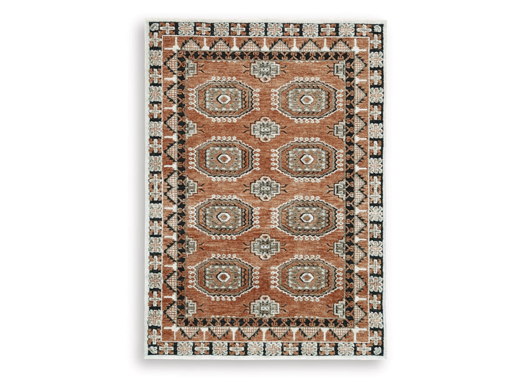 Qaabiz 5'x7' Area Rug by Ashley Furniture R407522