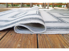 Load image into Gallery viewer, Matinwood 5&#39;x7&#39; Indoor/Outdoor Rug by Ashley Furniture R900032